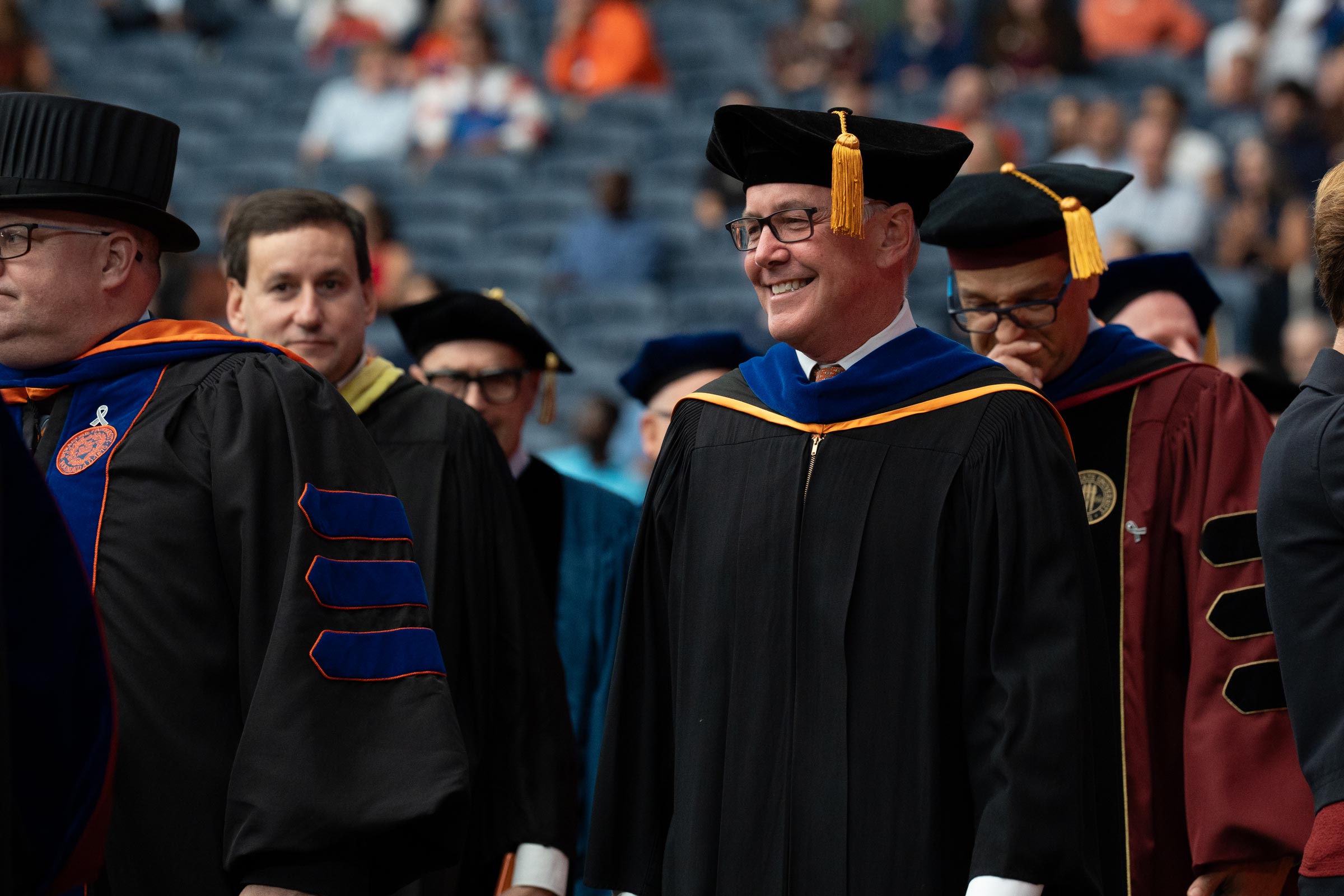 The academic deans, including Mark Lodato, Jeff Rubin and Alex McKelvie, join the procession at the start of the inauguration ceremony.