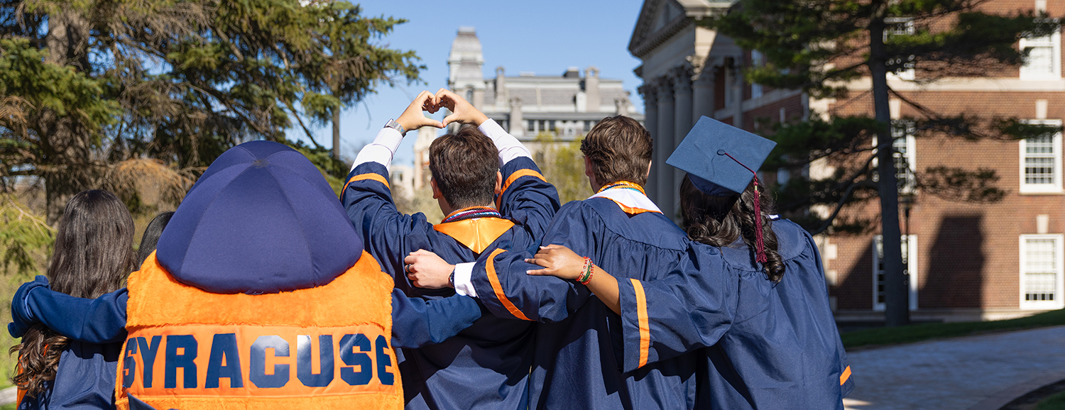 Otto and Syracuse Graduates Looking at the SU Campus