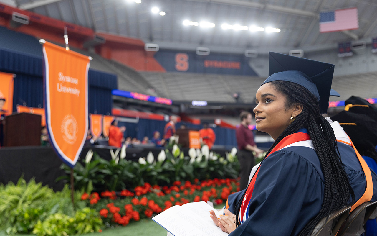 Student waiting for the speaker to take the stage