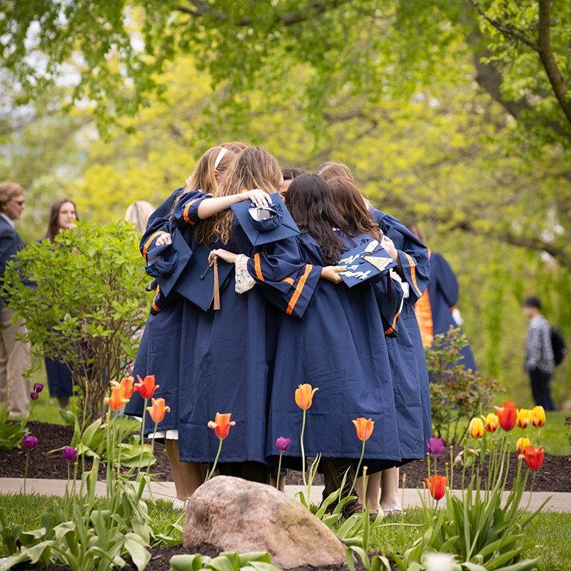 Students embracing on campus