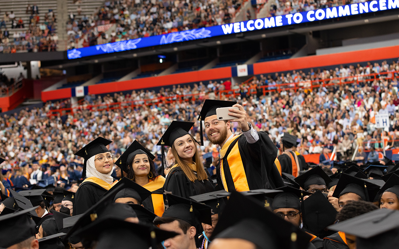 Graduating students taking a picture together