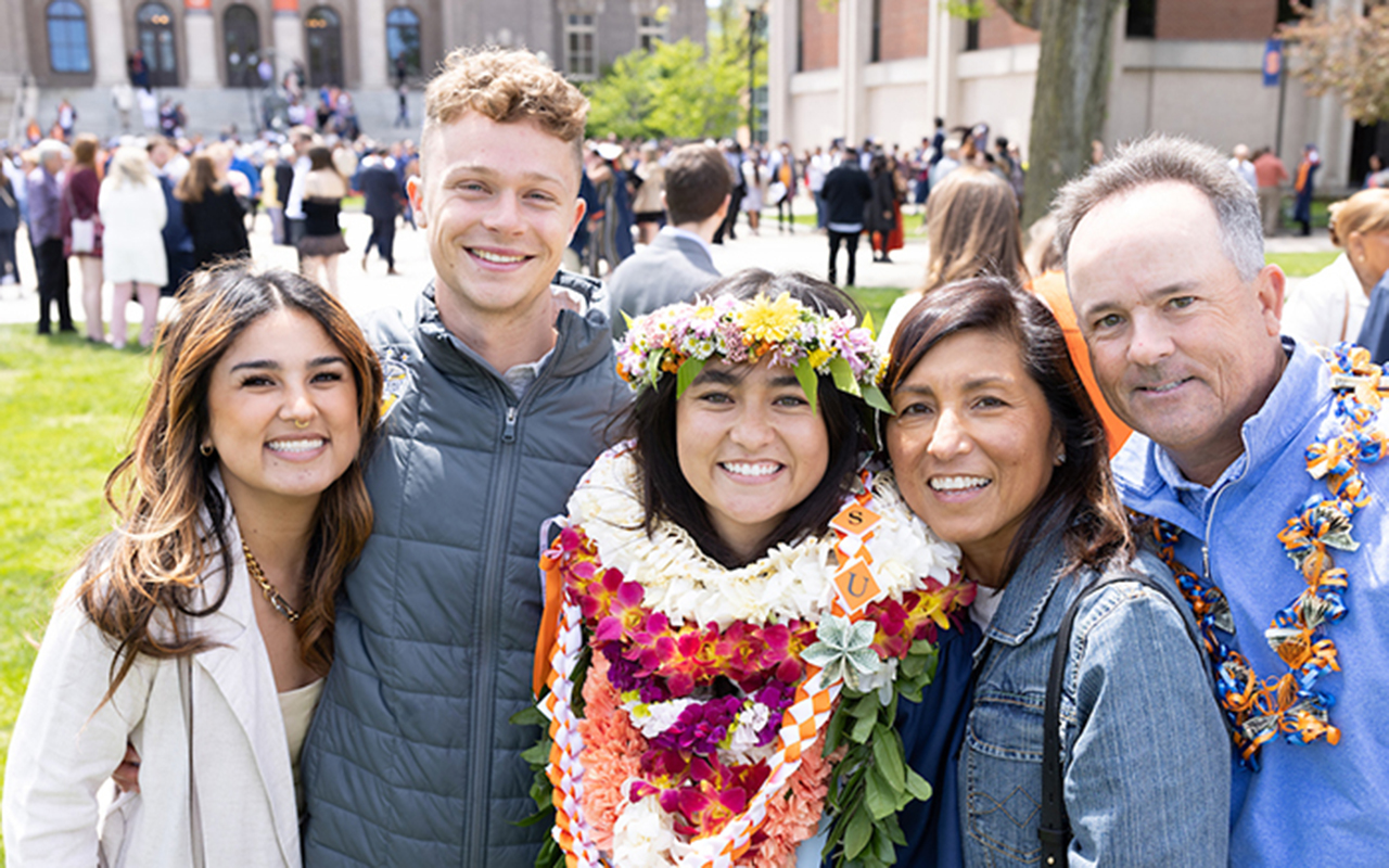 A family celebrating Commencement weekend