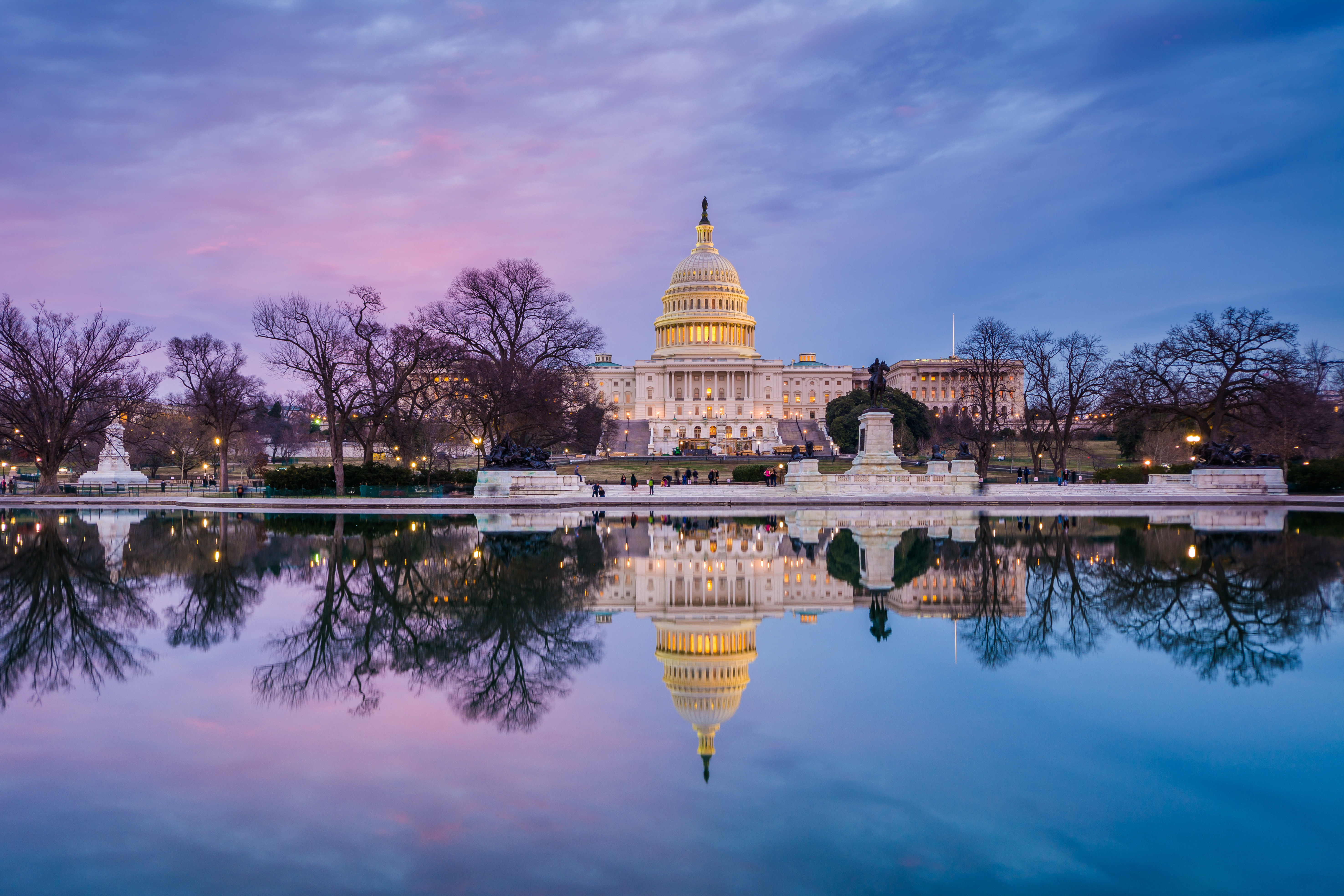 DC capitol building reflecting in the water at night. 