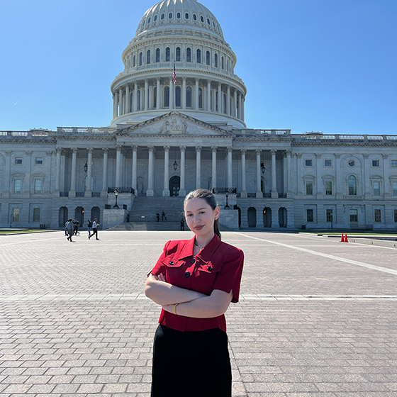 Mikah Bein '26 in front of capitol building. 