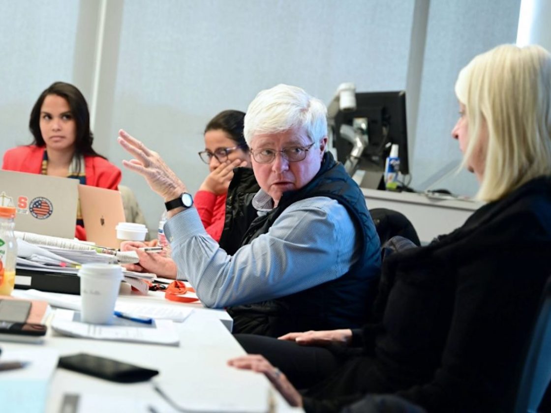 The Hon. Randel Johnson teaching in class with Camille Olson