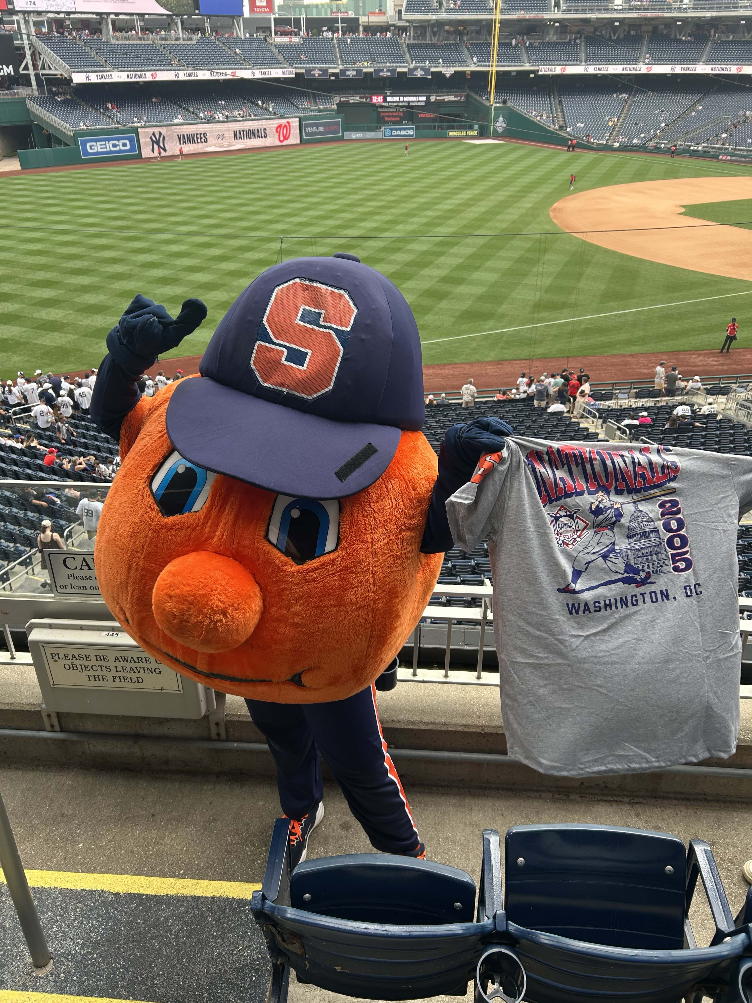 Otto posing at a baseball stadium