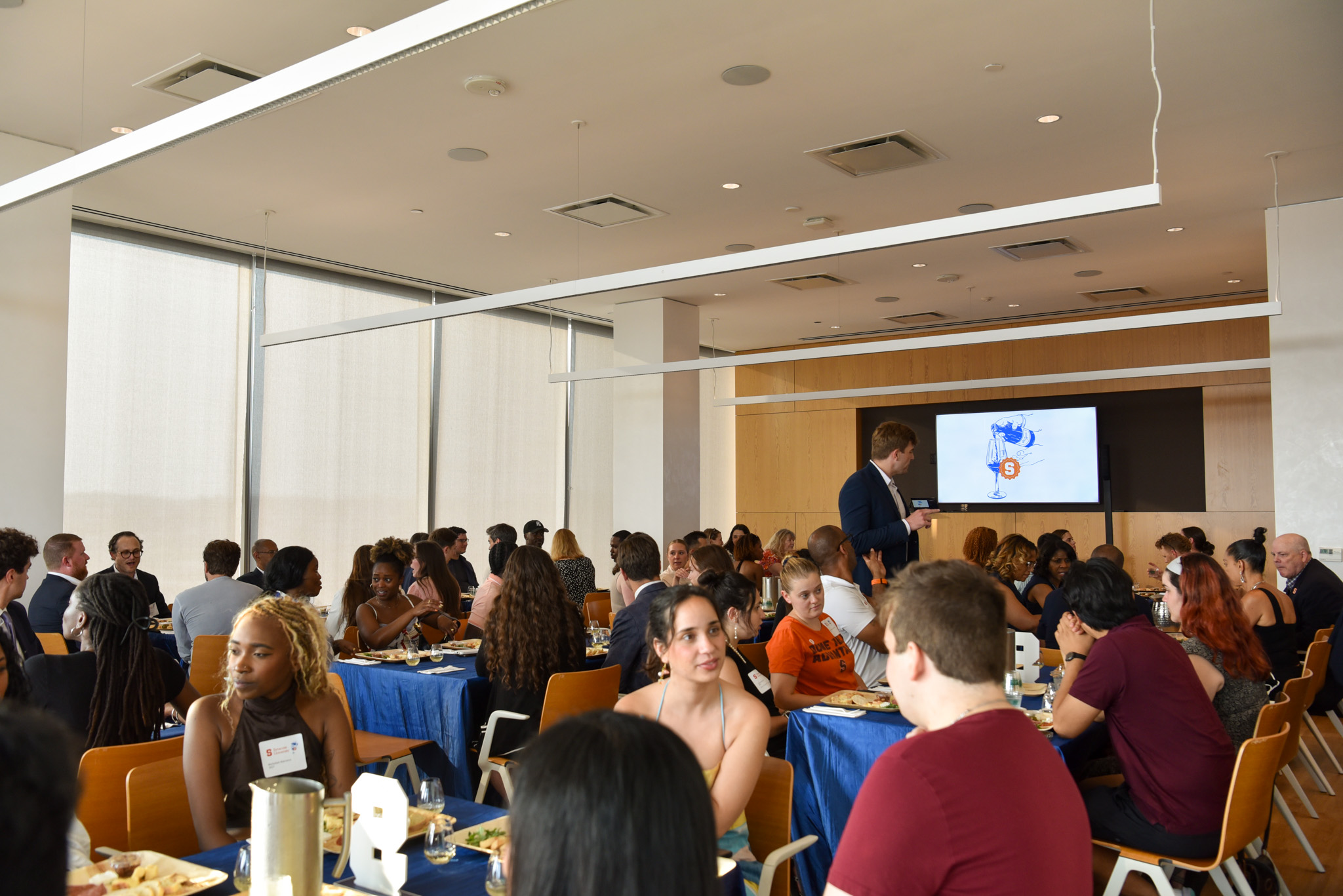 Filled room at SU DC for wine appreciation. 