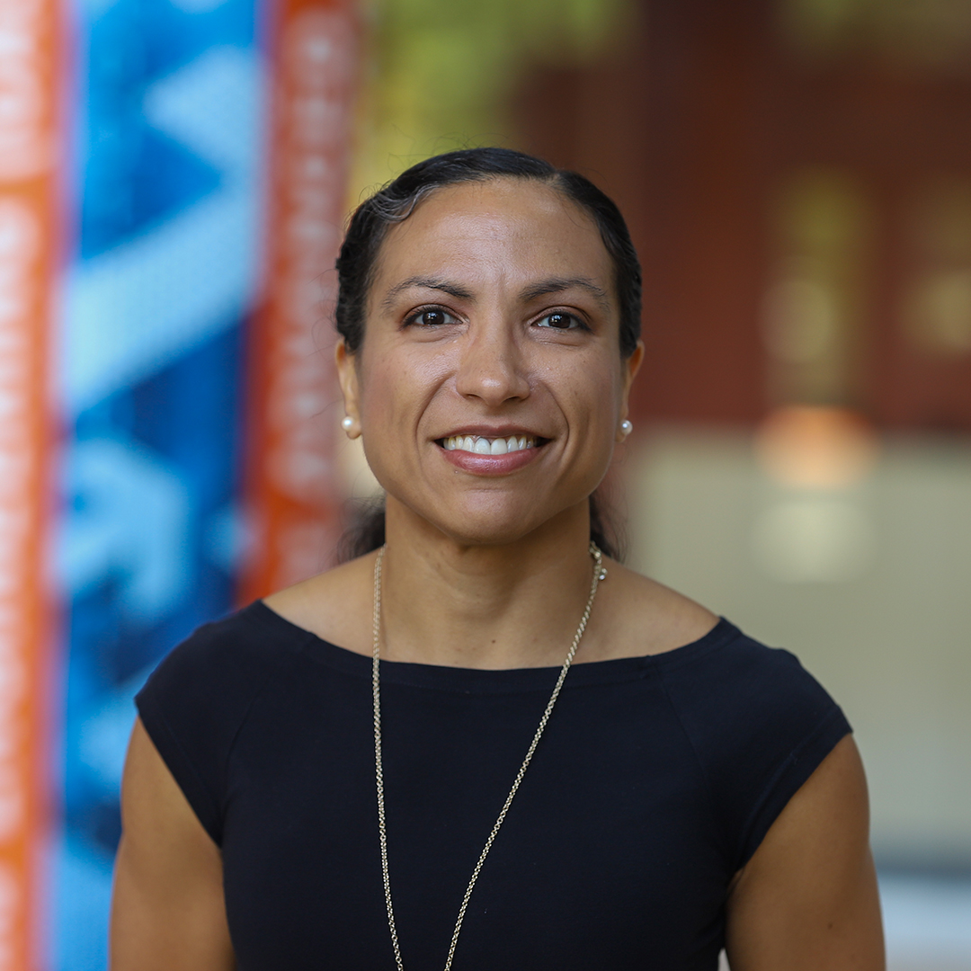 A woman smiling