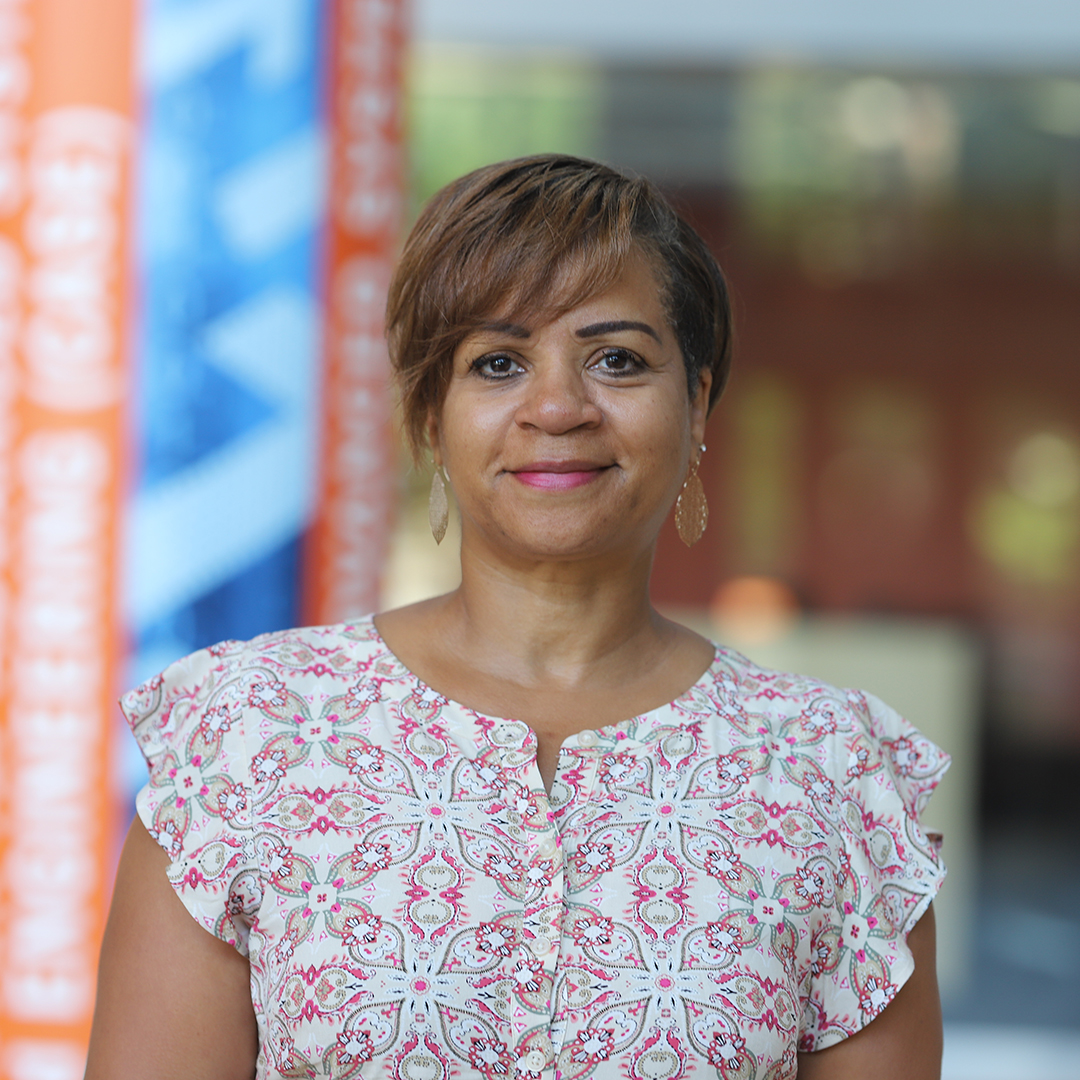 A woman smiling