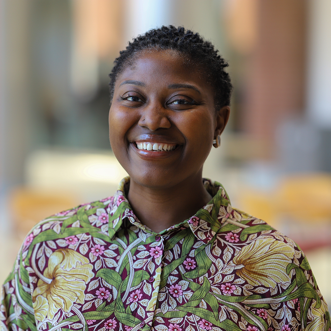 A woman smiling