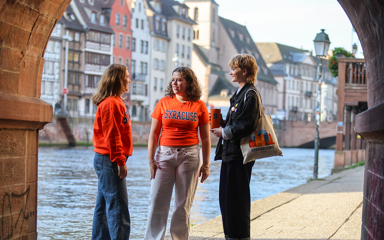 Three Women standing and talking