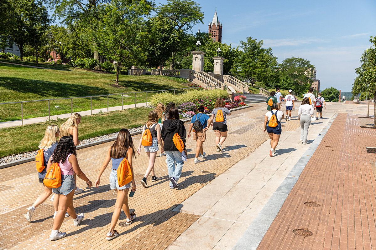 A group of students and adults walking