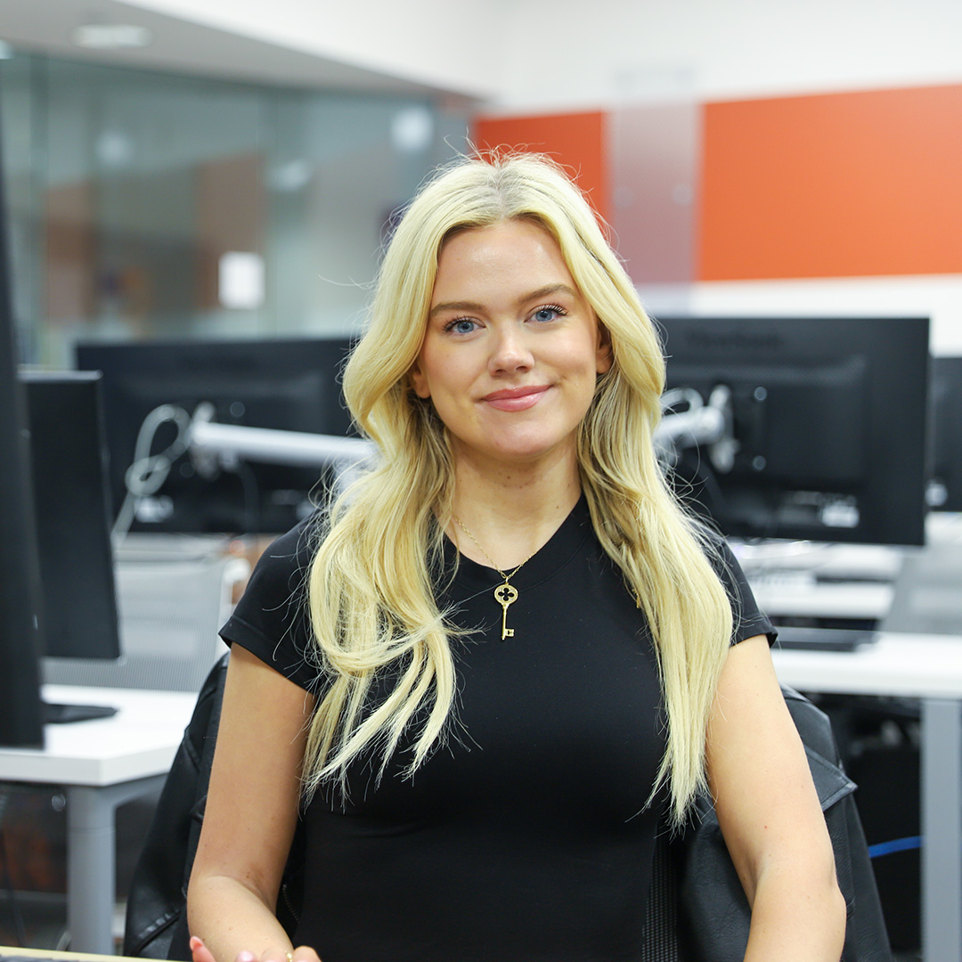A woman smiling