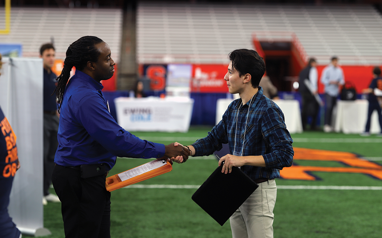 Two men shaking hands.