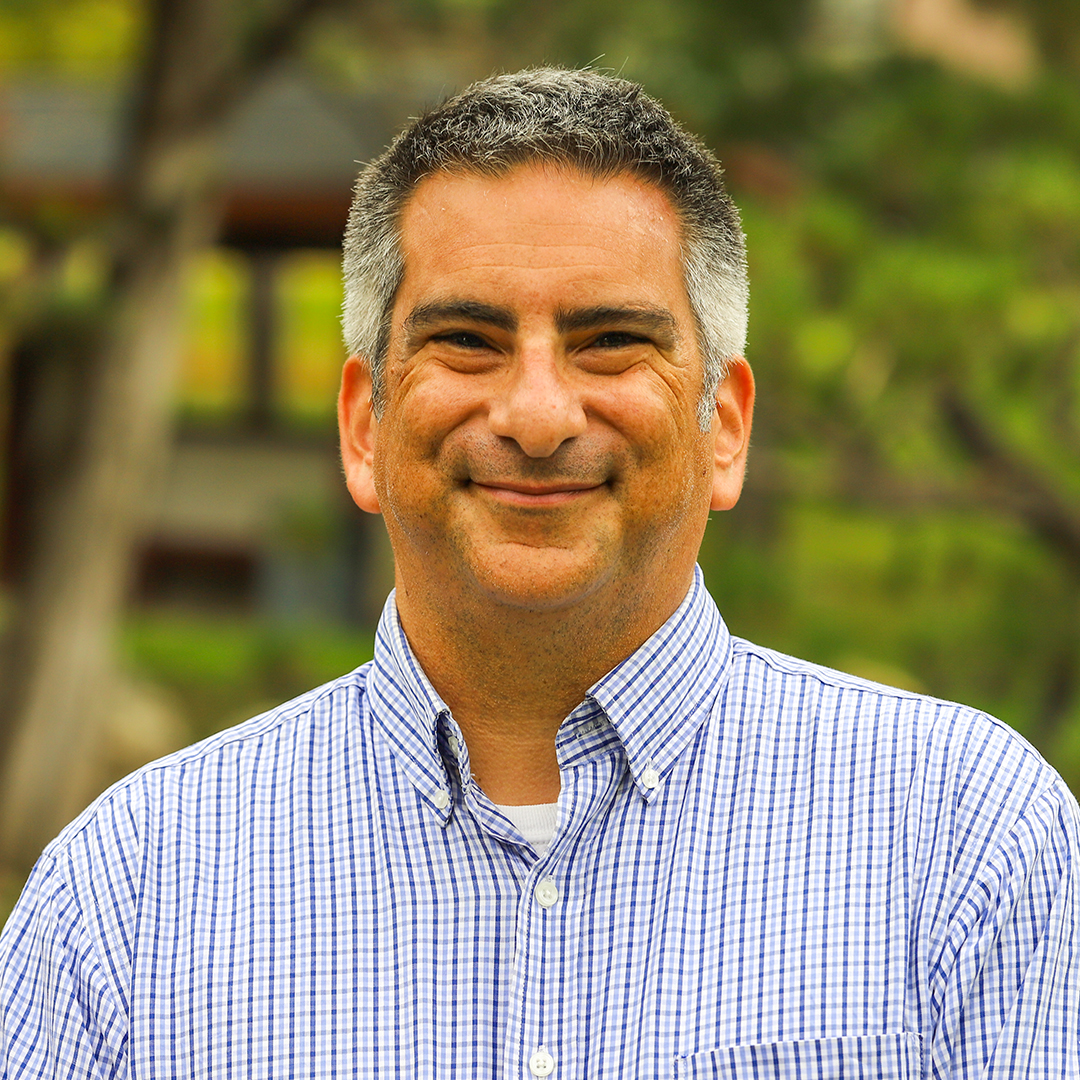 A man smiling.