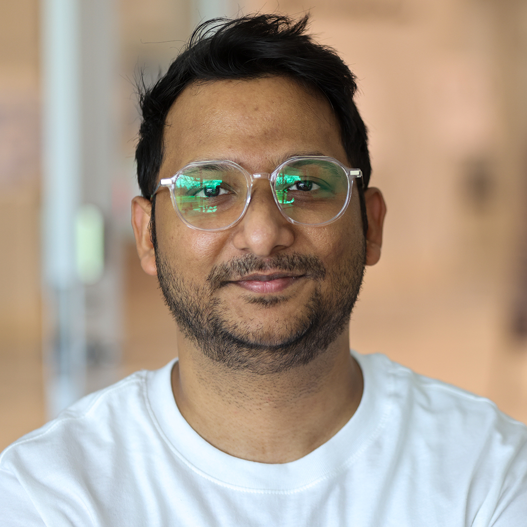 A man wearing glasses.