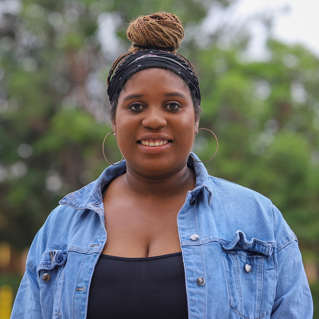 A woman smiling.
