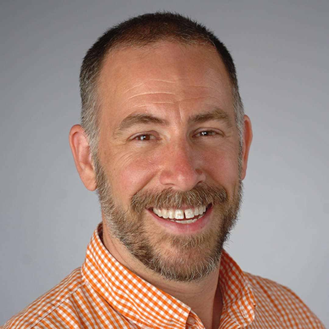 A man smiling.