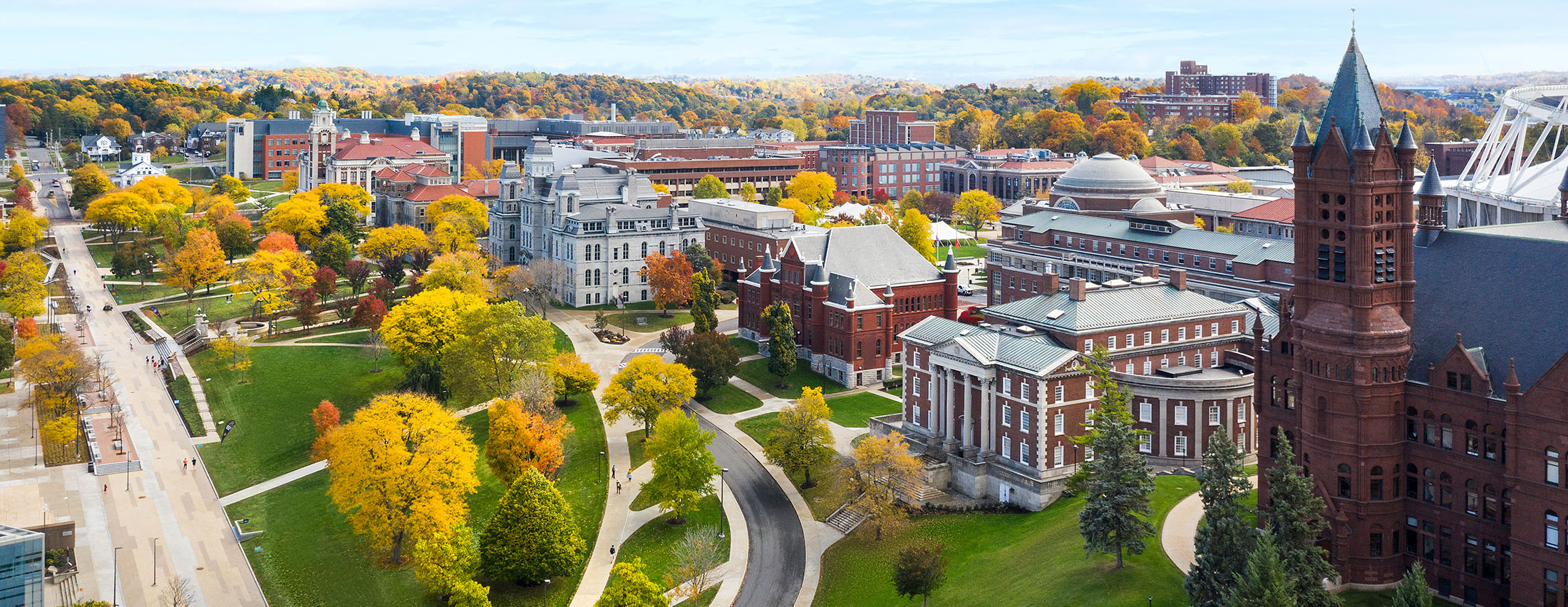The Einhorn Family Walk stretches out across campus in front of Crouse College close to where it begins.