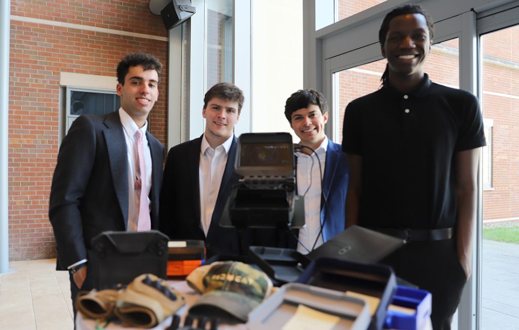 A student team presents their capstone design