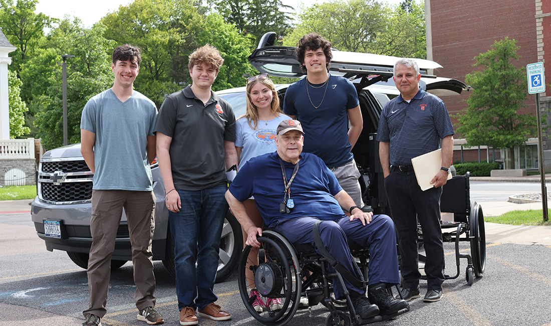 A team of Syracuse University engineering and computer science students with Jim DaRin