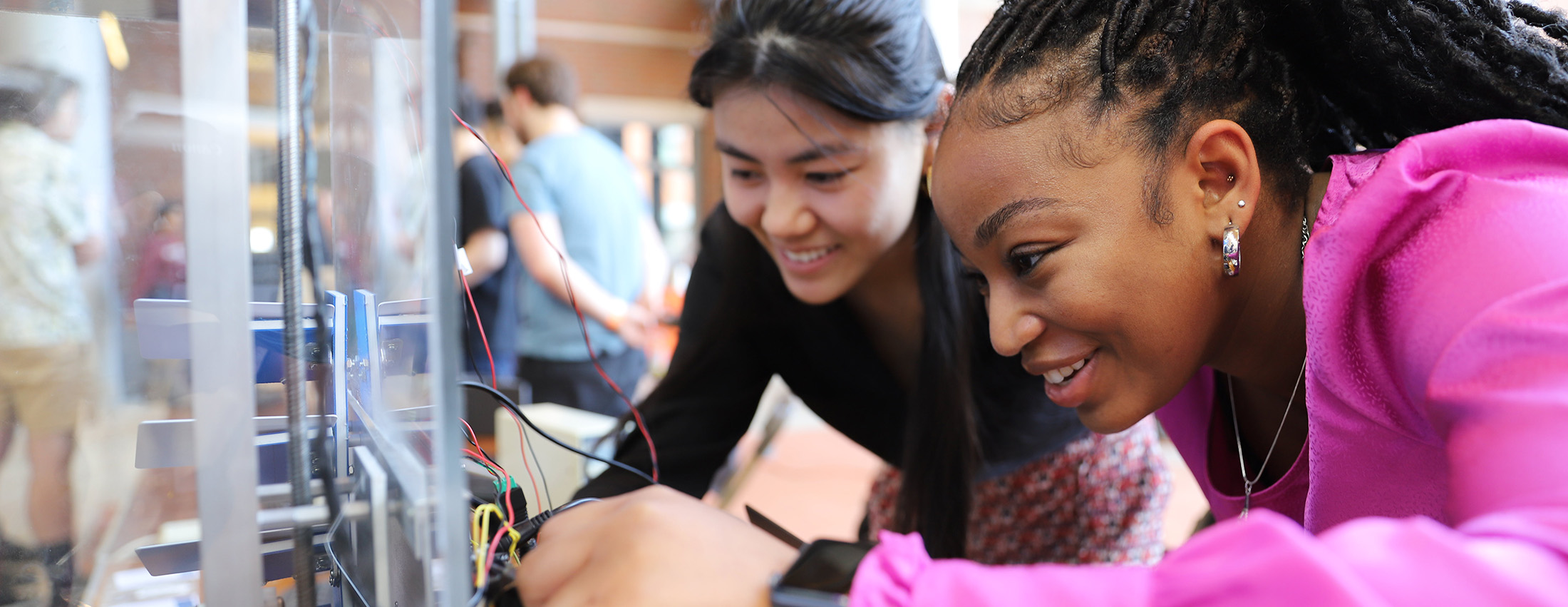 electrical and computer engineering students working on a project
