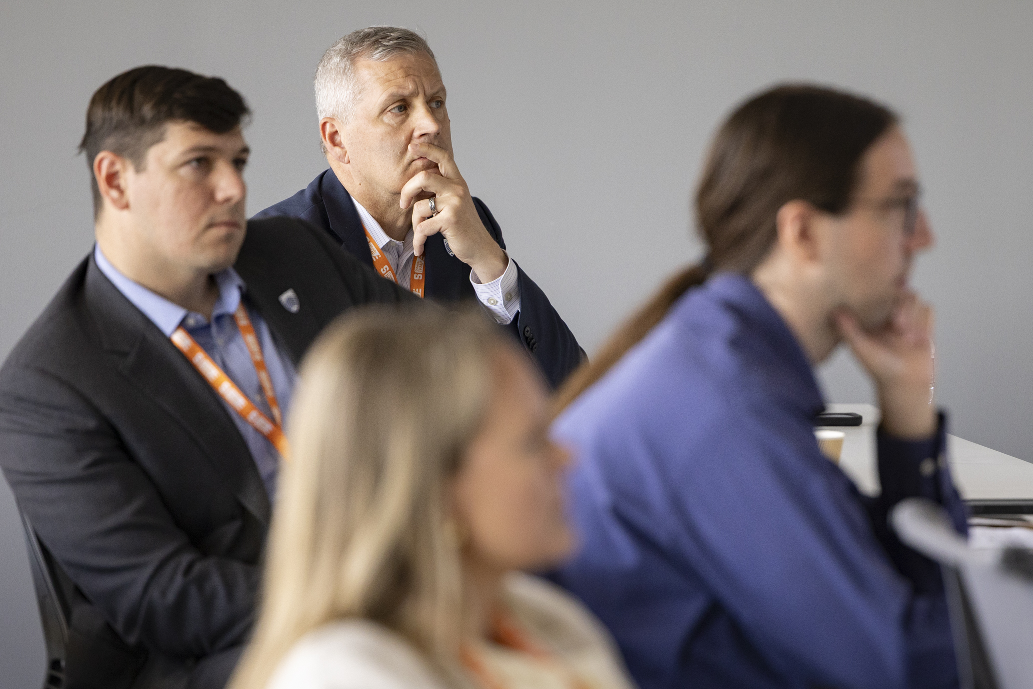 Attendees listening to a speaker at COP in DC.