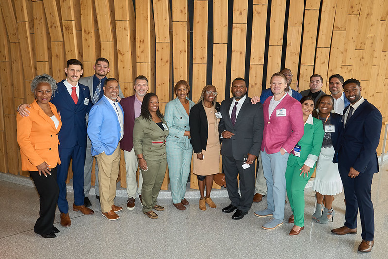 IVMF participants standing together. 
