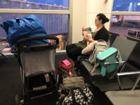 Jennifer in airport with baby during a PCS