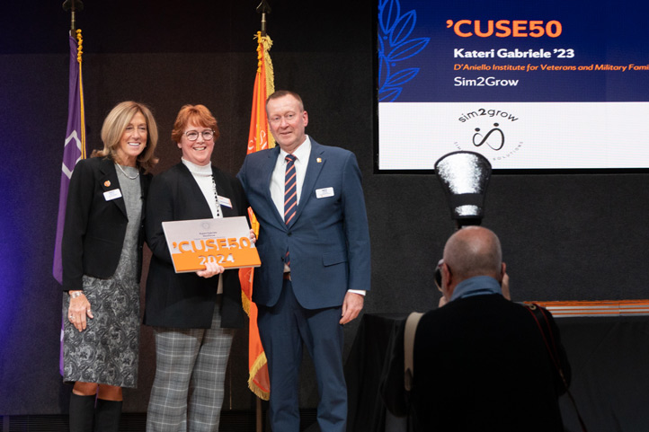 Kateri Gabriele receiving CUSE50 award