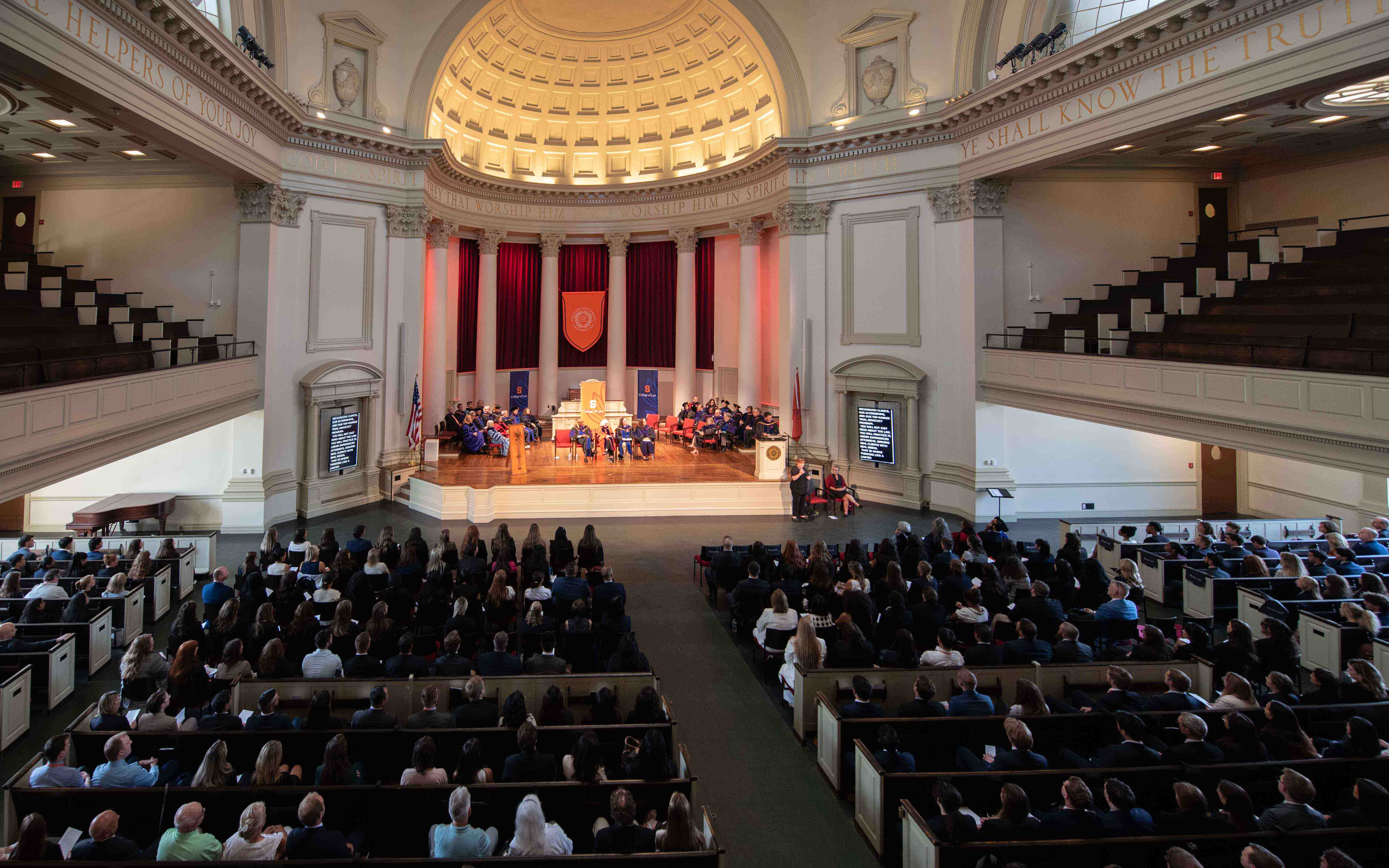 Aerial view of Henricks Chapel Opening Convocation Ceremony, showing the stage and students.