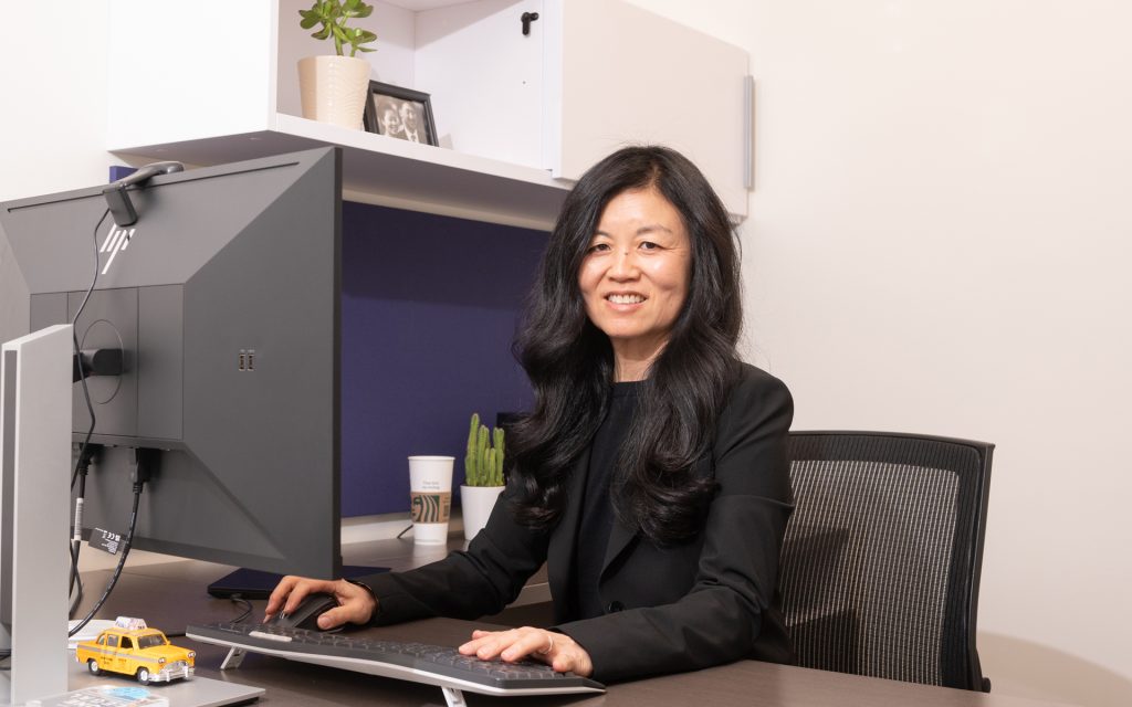 Leslie Park at her desk at Hallmark Media