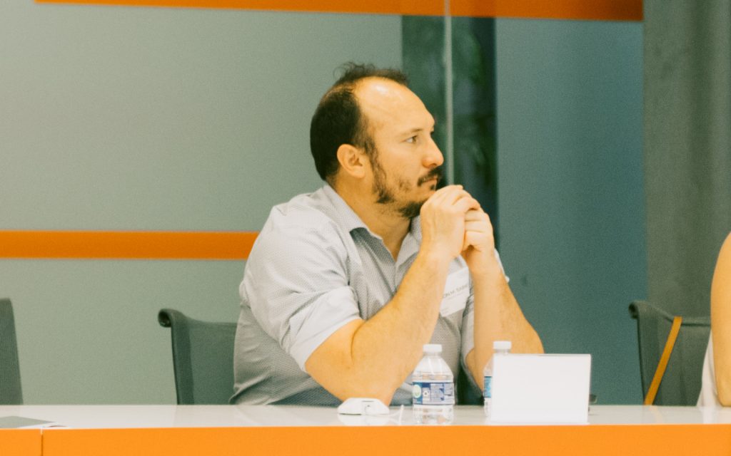 A student pays attention during a presentation