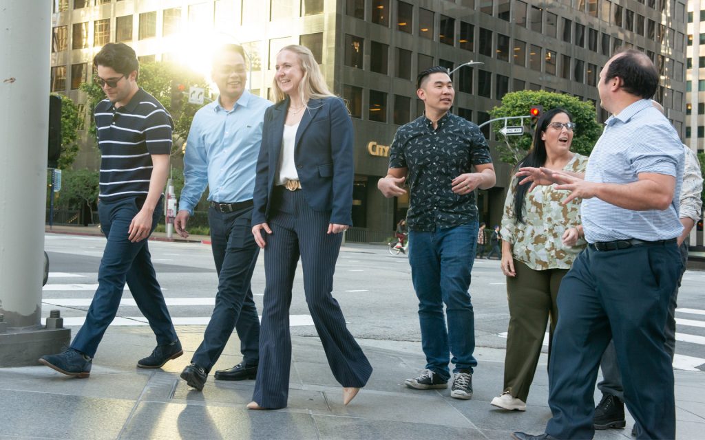 Students walk down a street in Los Angeles