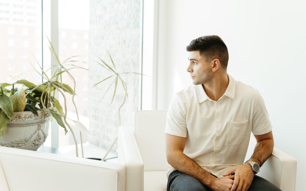 A student turns his head and looks out the window