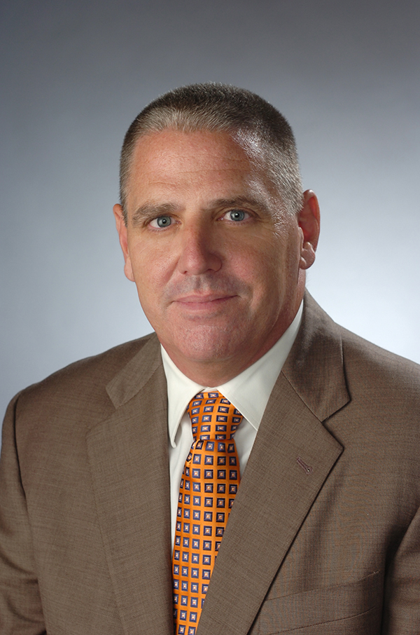 JOHN T. WOLOHAN