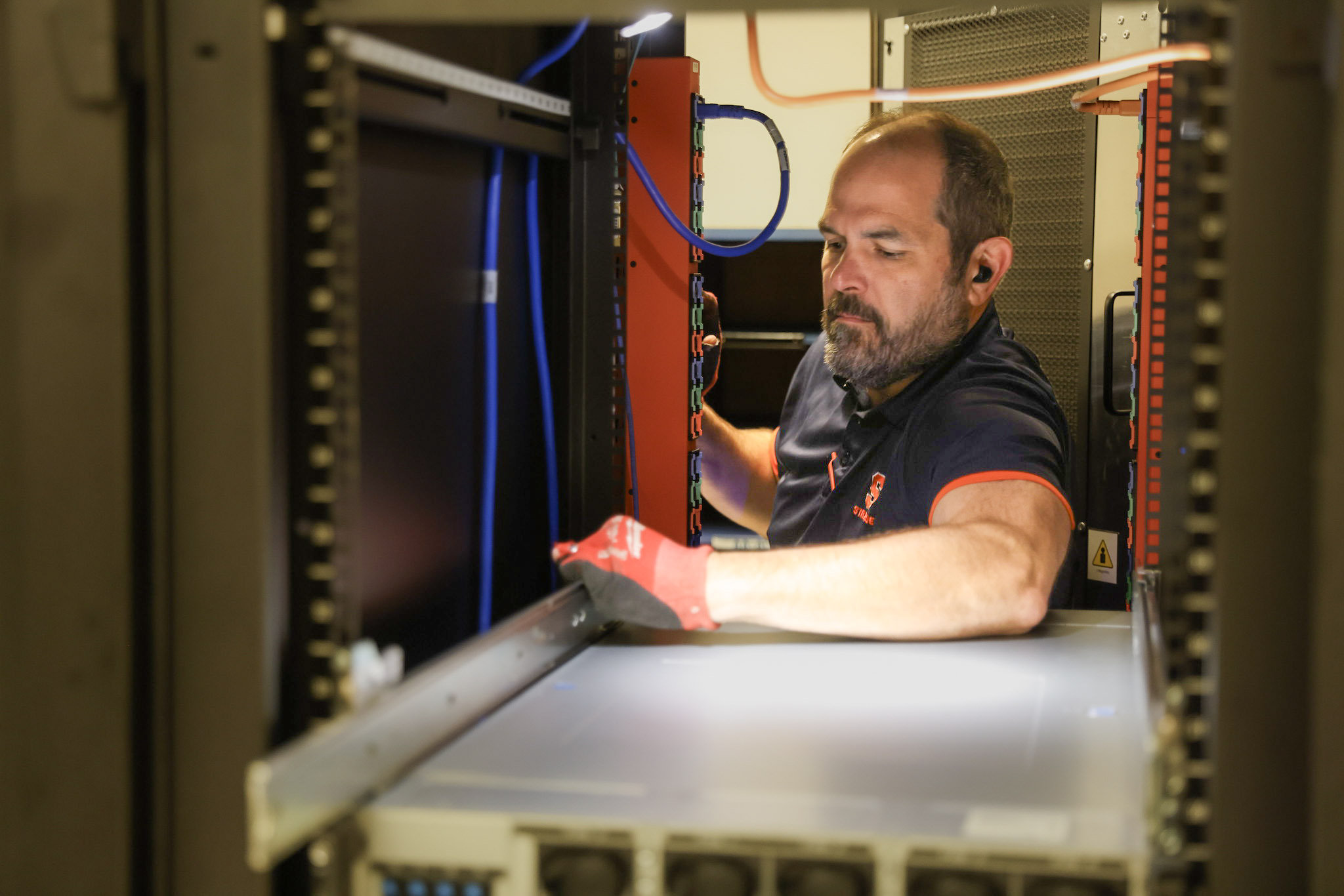Man installing computer server