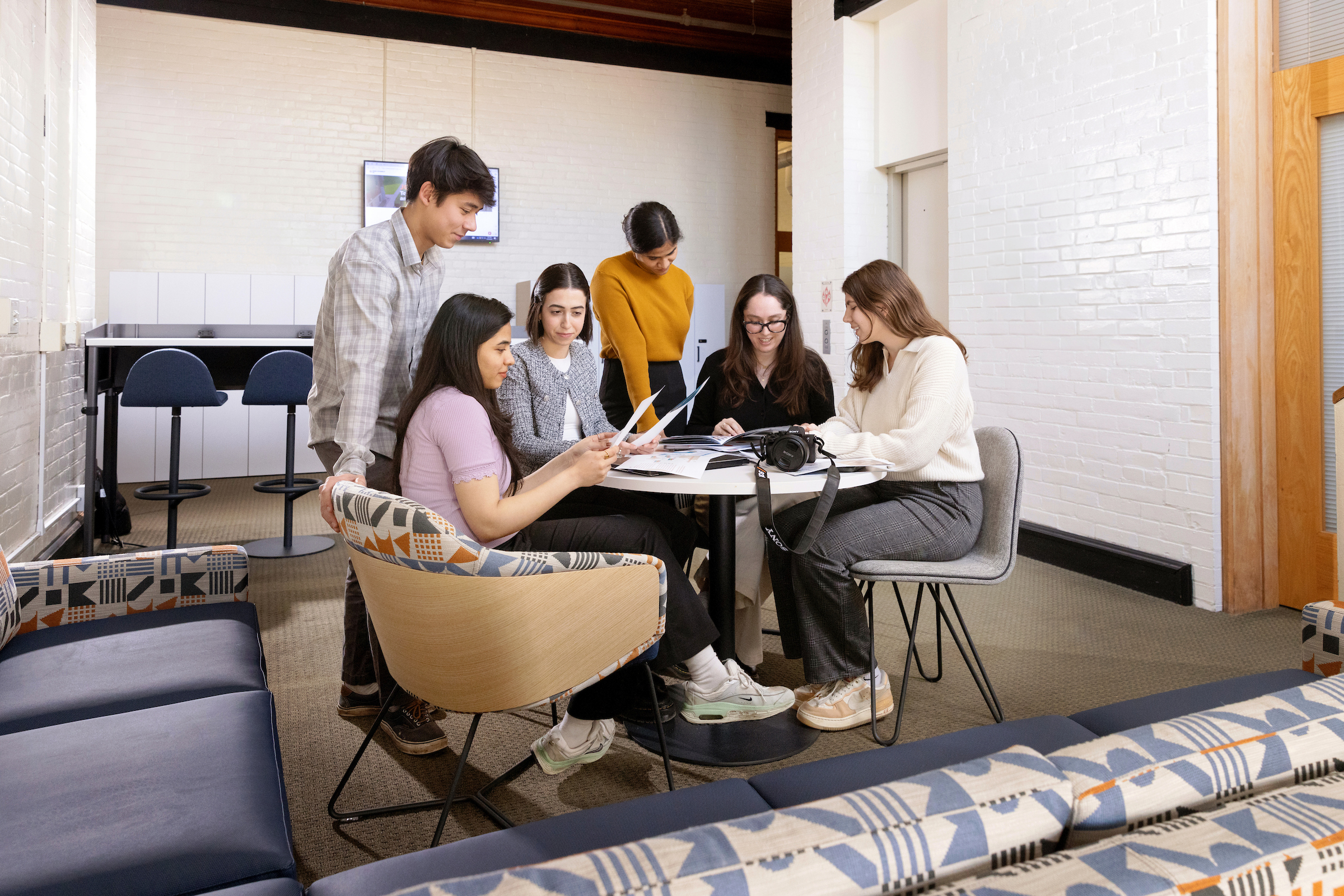 Students working together around a table